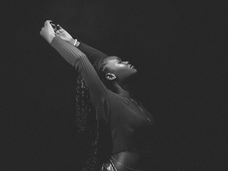 Person performing a smooth yoga flow in a minimalist setting.